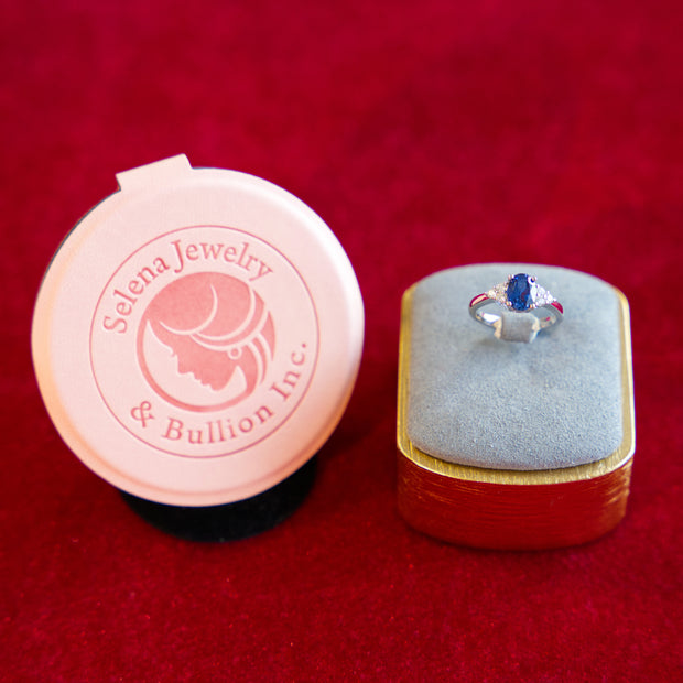 Selena Jewelry Bullion - Chambord 1.5 Carats Lab Grown Royal Blue Sapphire Oval Milgrain Three-Stone Ring