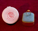 Selena Jewelry Bullion - Hofburg Ruby Tone Pear Cut Halo Ring
