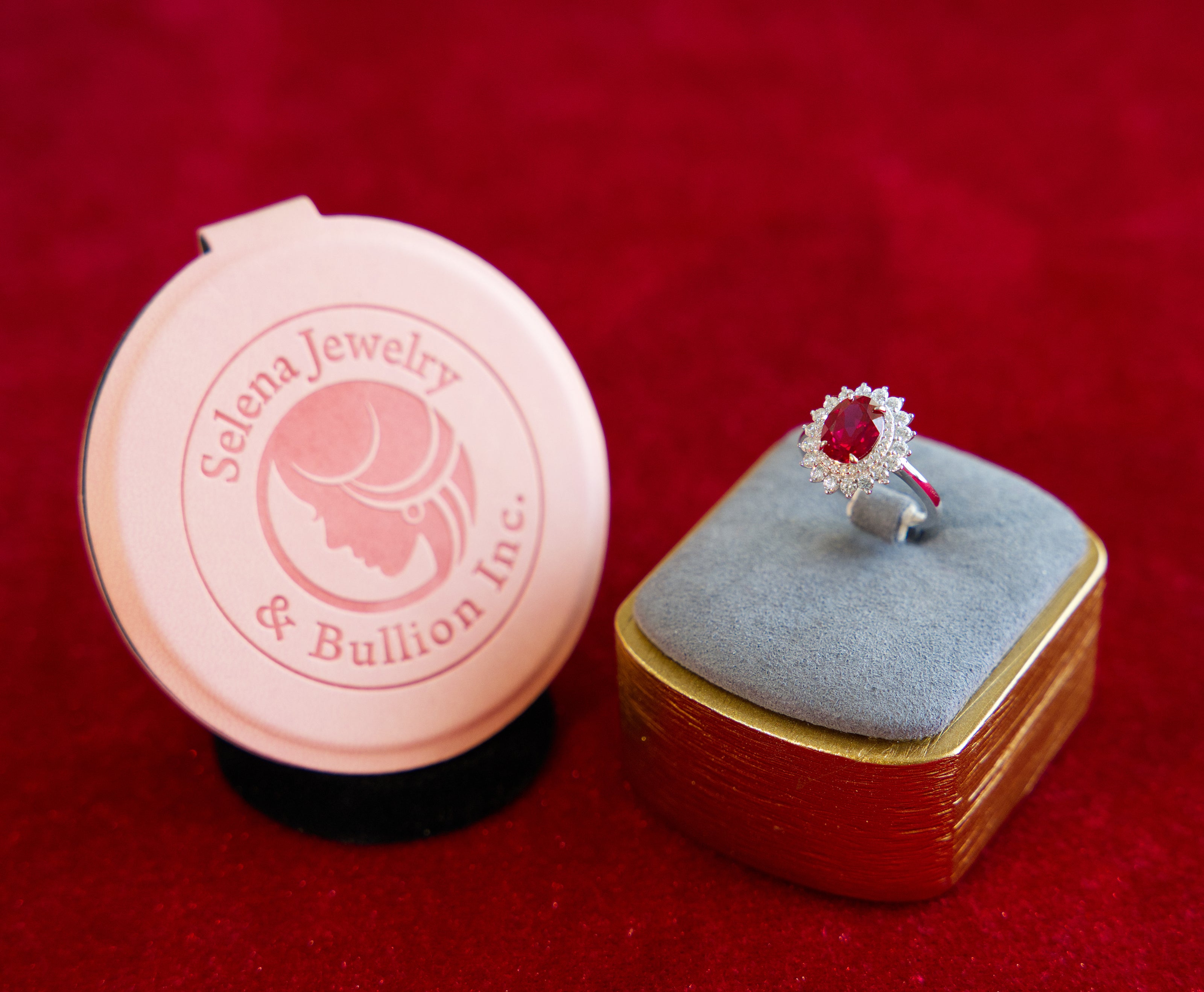Selena Jewelry Bullion - Fontainebleau 2 carats Lab Grown Ruby Oval Sunburst Halo Ring